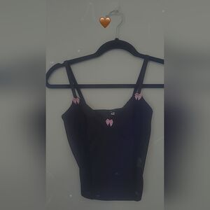 Elegant Black Top with Pink Accent